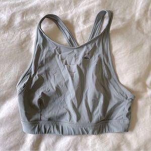 Alo yoga gray sports bra distressed with cut outs. High neck size Small